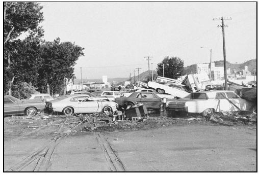 The force of a flash flood carried these cars downstream. (Photo courtesy of National Oceanic and Atmospheric Administration (NOAA) Central Library.)